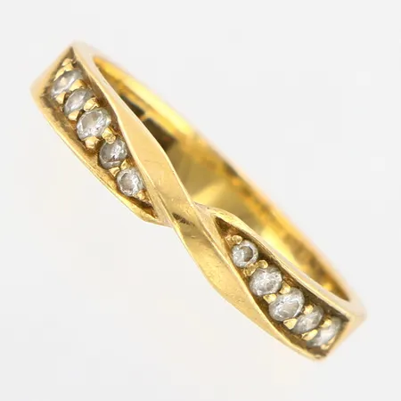 Ring med diamanter 0,22ctv, stl 16¾, bredd ca3mm, 18K Vikt: 2,8 g