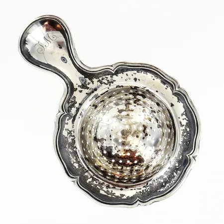 Tesil med gravyr JM, 110x70mm, J Wictorin svensk importstämpel, A8/år 1927, silver 830/1000. Vikt: 29,2 g