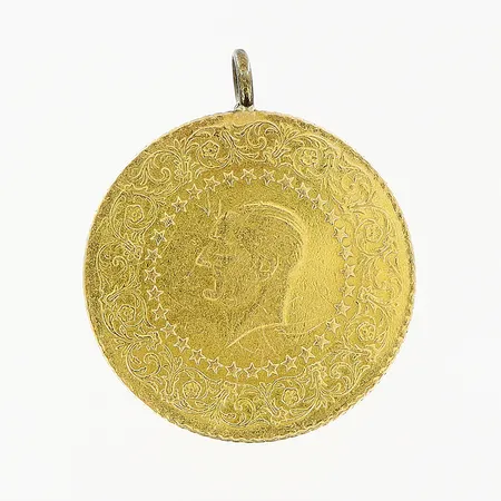 Hänge, myntliknande föremål, längd 26mm, Ø22mm, ögla ej i guld, 21K.  Vikt: 3,5 g