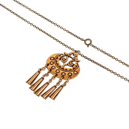 Hänge "Mångudinnan" i brons Kalevala Koru, Finland. Det är 28 mm brett, 54 mm långt, kedjans längd 62 cm. Vikt: 9,0g. 