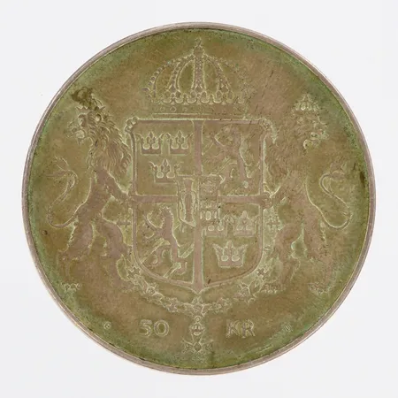 Jubileumsmynt Kungabröllopet år 1976, Ø36mm, nominellt värde 50kr, silver 925/1000 Vikt: 26,9 g