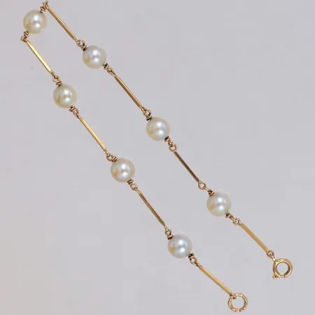 Armband med odlade pärlor Ø5,6-5,8mm, längd 18,5cm, bredd 0,8mm, 18K Vikt: 3,8 g