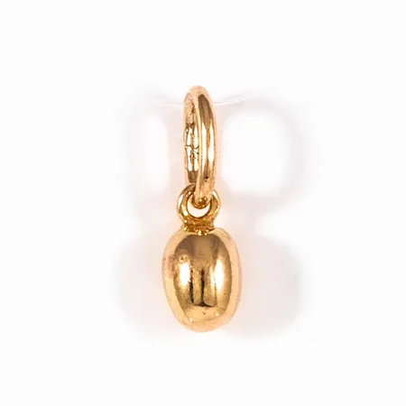 Hänge guldägg i 18K guld. Det är 12,5 mm långt inkl. ögla och väger 0,95g.