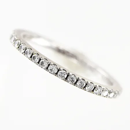 Ring, diamanter 0,23ctv enligt gravyr, stl 16, bredd 1,6mm, vitguld, gravyr, 18K.  Vikt: 1,9 g