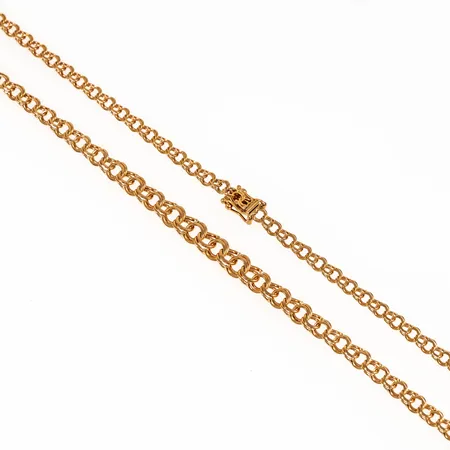 Collier bismarck i 18K guld. Det är 45 cm långt, 3,3 - 5,7 mm brett och väger 12,7g. Kistlås. 