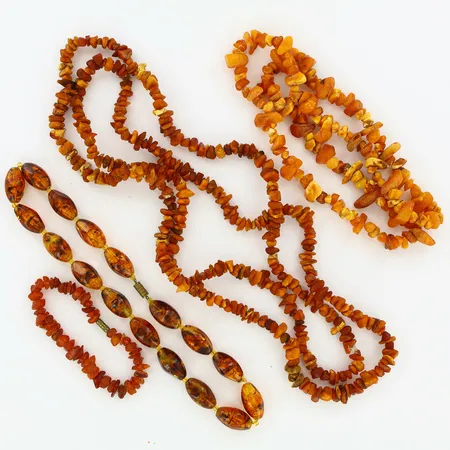 3 collier och 1 armband med brärnsten Vikt: 0 g