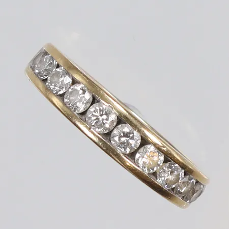 Ring med diamanter 11xca0,09ct (en sten något lös) stl 17 bredd 3-4mm GHA 18K Vikt: 4,1 g