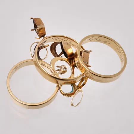 Diverse defekt guld, 18K, vikt 11,69g.