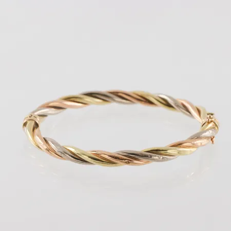Armband stelt,längd ca 7.5 cm,ojämnheter,18k. Vikt: 15,1 g