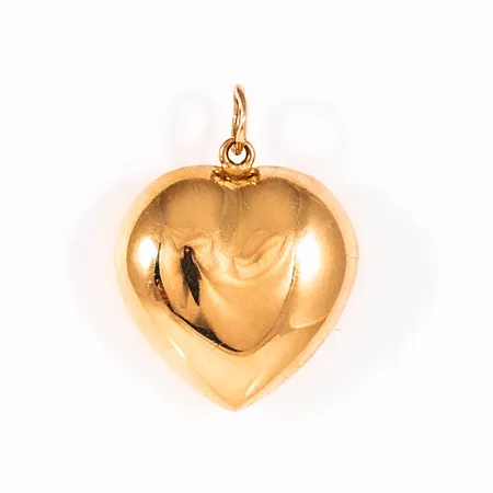 Hänge bulligt Hjärta i 18K guld. Det är 15,5 mm brett, 20,5 mm långt inkl ögla och väger 1,5g.