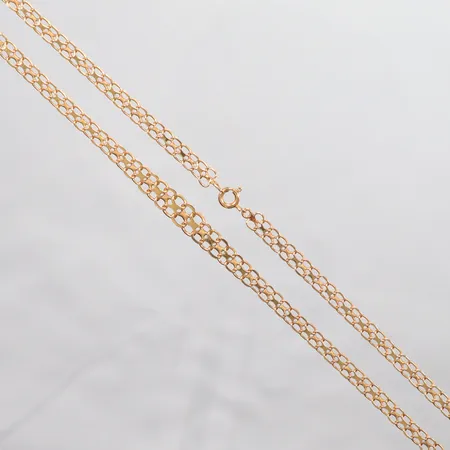 Kedja doserad x-länk, längd 49cm, bredd 4,5mm, 18K. Vikt: 12 g