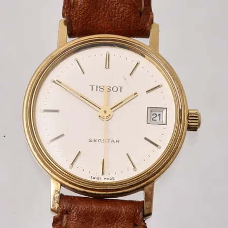 Damur Tissot Seastar i 18K guld, Ø21mm, qvartz, datum. personlig gravyr, läderband, i behov av batteribyte. Vikt: 0 g