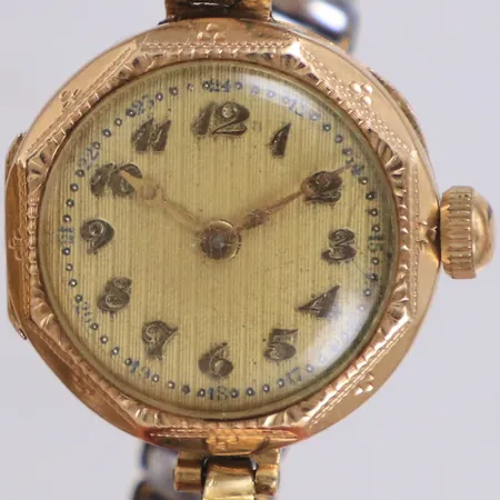 Damur, boett i 14K, manuell, 21mm, boettnr 45292, defekt, går ej, repig, bucklig boett, flexarmband i stål ej, inga tillbehör.