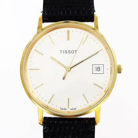 Herrur Tissot, 18K, quartz, Ø34mm, vit urtavla, datum, sekundvisare, original läderband 23cm, gravyr, i behov av batteribyte, manual, etui.