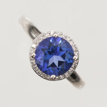 Ring med blå topaz och diamanter, 24xca0,01ct, stl 16, bredd 1,6-10mm, vitguld, GHA, 18K Vikt: 3,8 g