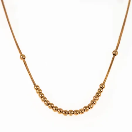 Halvstelt collier i 18K guld med delvis rörliga småkulor. Det är 43 cm långt, 0,9 - 2,4 mm brett och väger 3,9g. Karbinhake. Stämplat KFS 750.