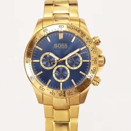 Herrur Hugo Boss Ø44mm ref nr HB.243.1.34.2850 snr 5.127.7790 quartz, kronograf, guldfärgad stållänk, smärre slitage, behov av batteribyte Vikt: 0 g