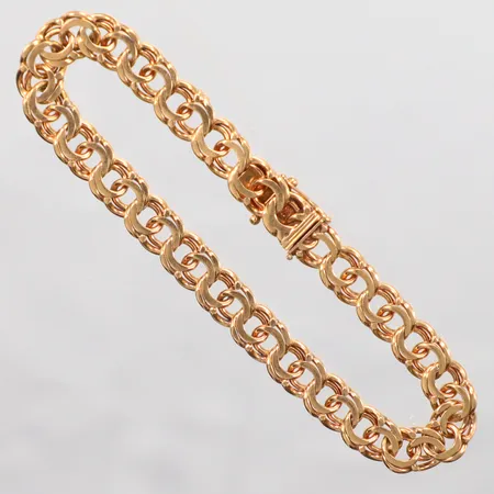 Armband, bismarck, längd 20cm, bredd 7mm, en låsåtta saknas, 18K. Vikt: 18,4 g