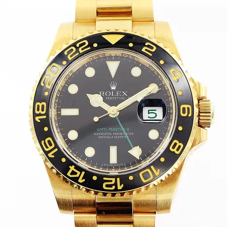 Herrur Rolex Gmt-Master II, 18K, automatisk, Ø40mm, svart urtavla, ref 116718, serie nr Z675145, verk nr 3178763, caliber 3186, boett nr 2378, oysterlänk 18K 20cm, certifikat Juli 2007, Zegg & Cerlati, Monaco, bruttovikt: 217,3g, inga tillbehör utöver cert.