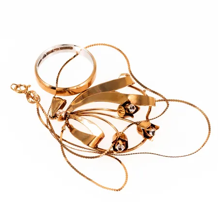 Diverse defekt / graverat guld 18K 8,1g bto.