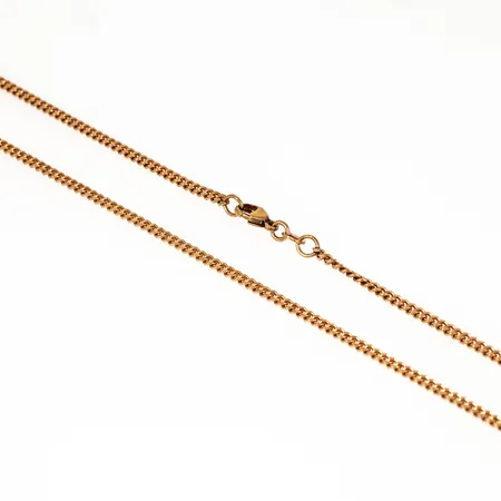 Kedja Pansar i 18K guld. Den är 50 cm lång, 2,3 mm bred och väger 9,9g. Karbinhake. Stämplad Balestra, 750.