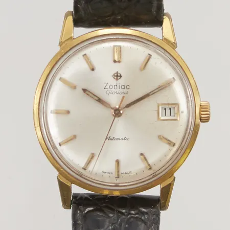 Herrur Zodiac Glorious, 33mm, automatisk, sliten doublé, datum, defekt läderband.