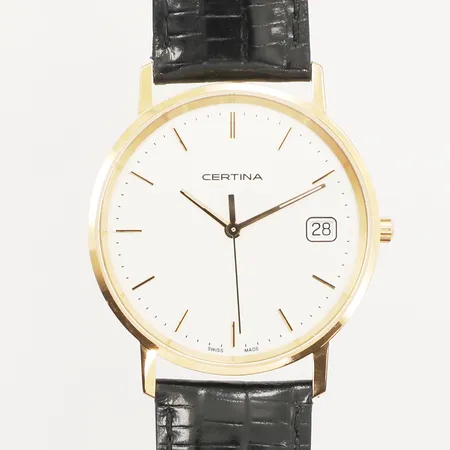 Armbandsur Certina, 18K, Ø34mm, quartz, går ej, datum, gravyr, läderarmband, inga övriga tillbehör Vikt: 0 g