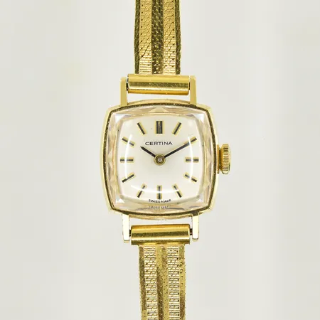 Damur Certina 18K, stl 17x17 mm, manuell, boettnr 0409044, serienr 266110, länk i 18K, total längd inklusive ur 16-16½ cm, fungerade vid testtillfället, Bruttovikt 22,7g