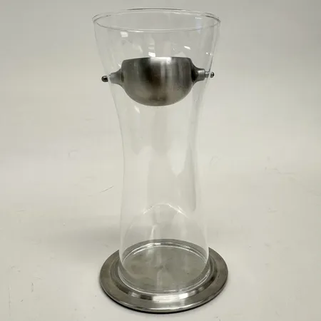 Ljusstake, Loop av Georg Jensen, höjd 18cm, glas och metall, design Holmbäck & Quaade Skickas med postpaket.