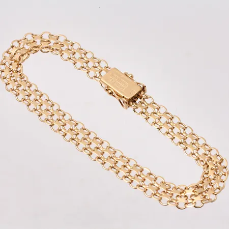  Armband i 18K guld, 19cm, X-länk, bredd 7,5mm, tillverkad av BEH Bengt Hallberg Guldsmeds AB, år 1966, vikt 8,83g.