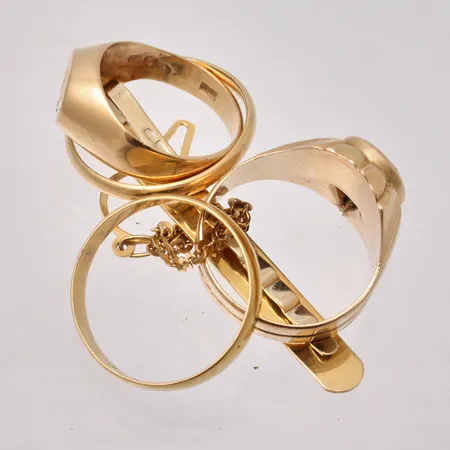 Diverse defekt guld, 18K, vikt 20,57g.