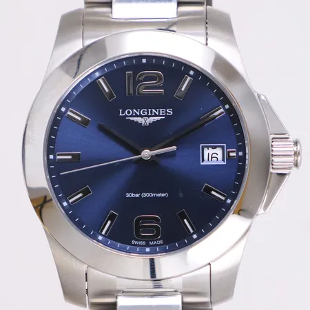 Armbandsur Longines Conquest, Ø34mm, quartz, stål, marinblå urtavla, datum, 30 bar, ref-nr L33774, serie-nr 55015644, certifikat Barcelona Feb 2025 kvitto 2025, box, ytterkartong, nyskick