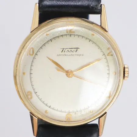 Herrur Tissot 14K, manuell, 32mm, skadad urtavla, repigt plexiglas, trasigt läderarmband ej original, inga tillbehör.