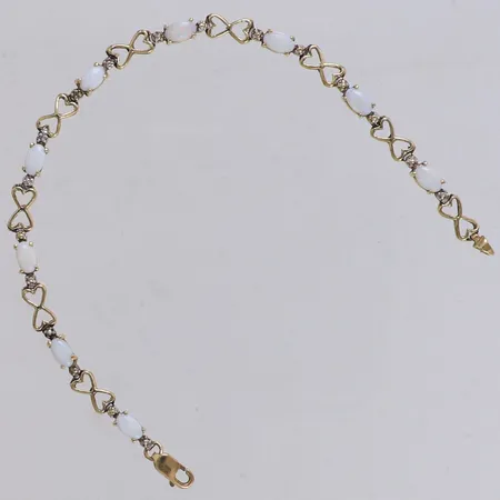 Armband med opaler, längd 16cm, bredd 4mm, 10K Vikt: 3,8 g