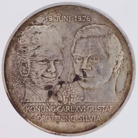 Minnesmynt 50Kr, Bröllopet mellan Konung Carl XVI Gustaf och Drottning Silvia, 19 juni 1976, Ø36mm, 925/1000 silver Vikt: 26,8 g