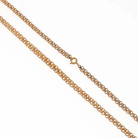 Collier x-länk i 18K guld. Det är 46 cm långt, 4,2 - 5,1 mm brett och väger 12,5g. Springring. Små ojämnheter.