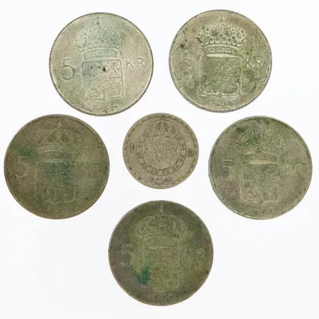 Sex mynt i olika valörer och årtal, silver 400/1000 Vikt: 96,9 g