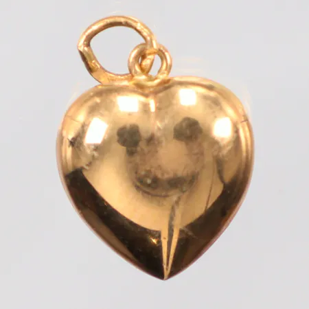 Hänge hjärta längd 1,5cm, bredd 12mm, ihåligt, 18K. Vikt: 0,7 g