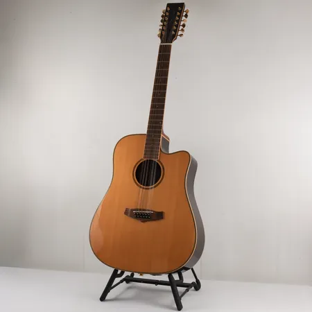 Gitarr Akustisk Tanglewood TRD-12-CE T09020455 topp i solid gran,hardcase.Något märke/repa. Skickas med postpaket.