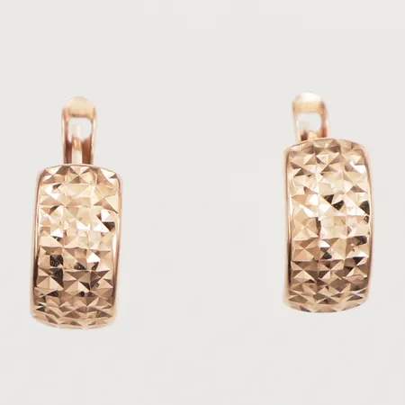 Ett par örhängen med mönsterdekor, ca 12mm, bredd 5,7mm, 14K Vikt: 1,3 g