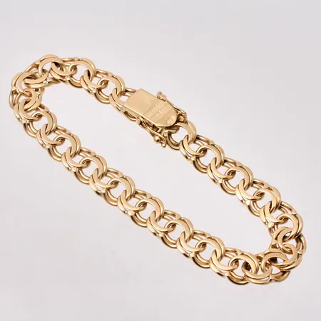 Armband i 18K guld, 17,5cm, Bismarck, bredd 8mm, tillverkad av Nyckel-Guld, år 1963, vikt 19,26g.