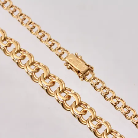 Collier i 18K guld, 42,5cm, Bismarck, bredd 4,7-8,3mm, tillverkad av Tore Clareus, vikt 24,54g.