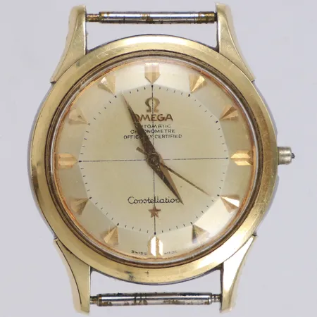 Herrur Omega Constellation Pie Pan, guld på stål, automatisk, 34,5mm, defekt, krona saknas, repigt plexiglas och boett, armband saknas, inga tillbehör.