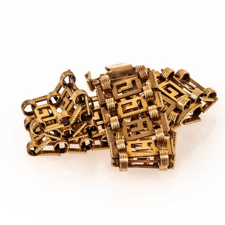 Defekt armband i 18K guld. Vikt: 15,2g.