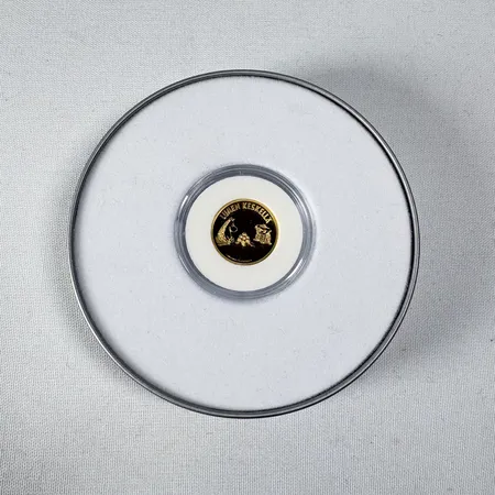 Guldmynt 10 Niue Dollar, muminmotiv, med äkthetscertifikat från Mynthuset Sverige, i etui, 24K 3,1g Vikt: 3,1 g