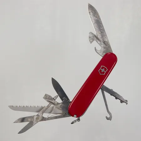Fällkniv/multiverktyg Victorinox, röd, 90mm, lätt slitage, utan tillbehör.