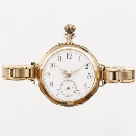 Fickur med flexilänk, 14K i ur inre boett i gulmetall, defekt, trasig, bruttovikt 40,0g