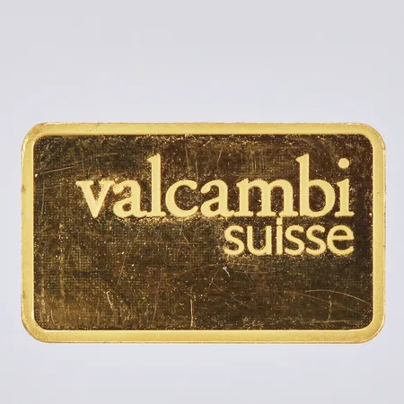 Guldtacka Valcambi nr AA450207 längd: ca 19 mm bredd: ca 12 mm bruten plombering 24K Vikt: 2,5 g