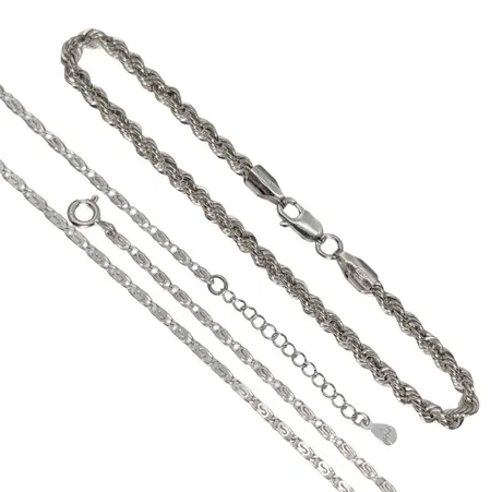Silversmycken, 2 delar, 925/1000, Halskedja Irrgång, längd 41,5-45 cm, bredd 2 mm, Armband Cordell, längd 18,5 cm, bredd 3,5 mm Vikt: 9,2 g