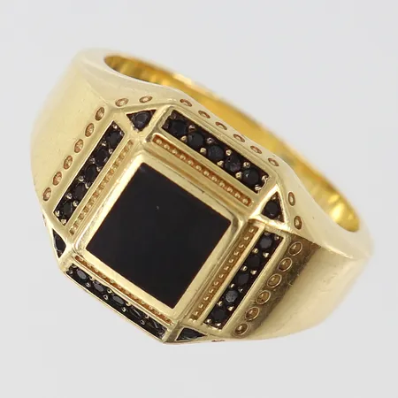 Klackring med svarta stenar, stl 20¼, bredd ca 4,4-14,4mm, repig, 18K Vikt: 10,7 g